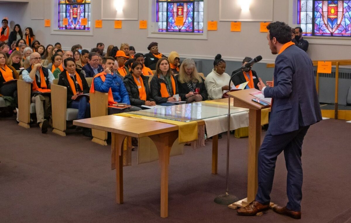 speaker faces crowd at Hunger Action Day 2024