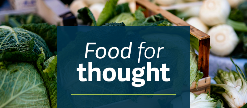 background image of leafy vegetables behind blue color block with Food for Thought in white text