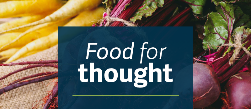 blue color block with Food for Thought in white text on background image of beets and yellow carrots