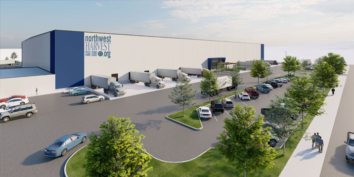 Architect rendering of Yakima Distribution Center. Front of building with trucks parked outside, with parking lot and landscaping.